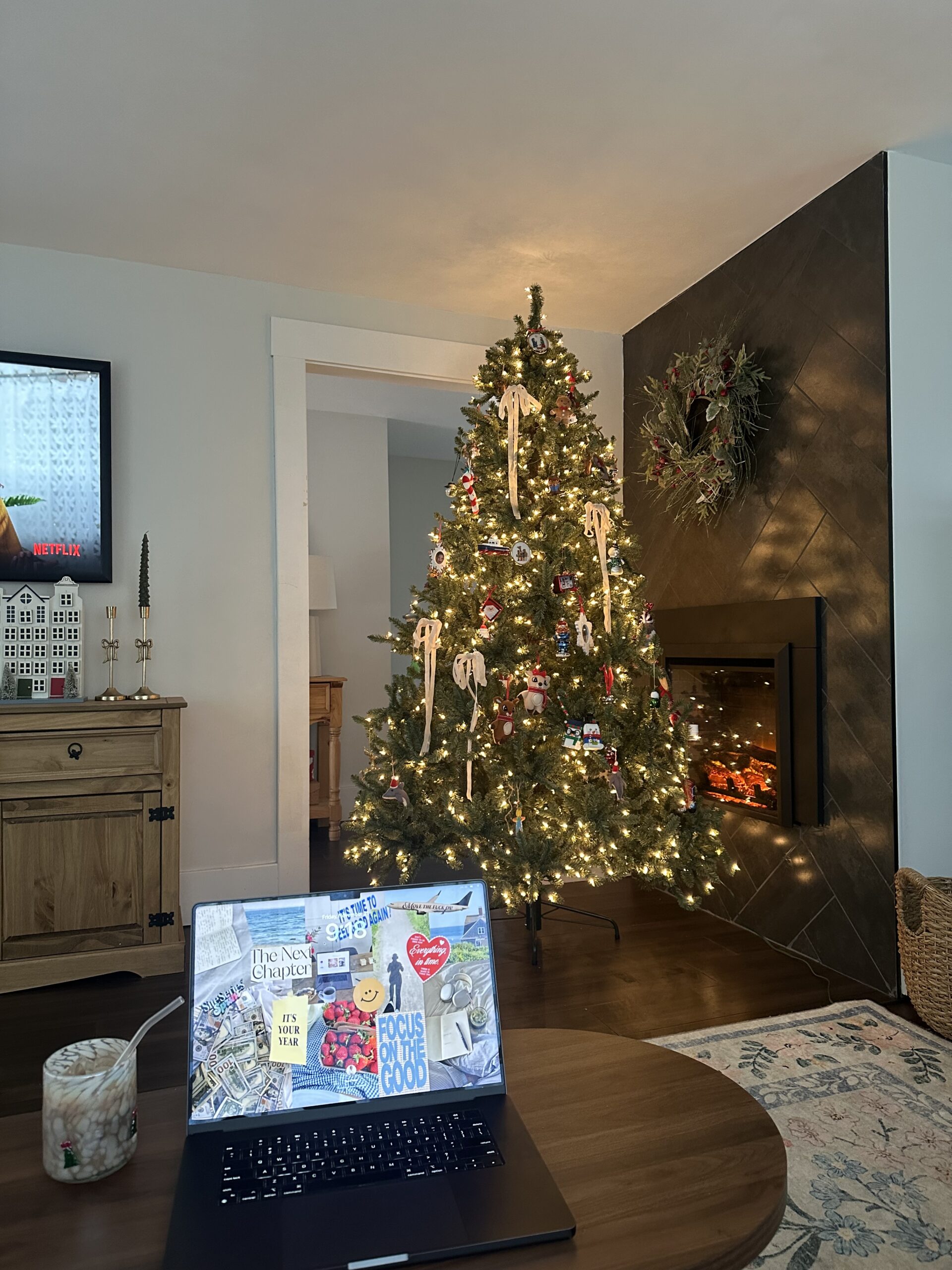 website copywriter sara joelle's laptop in front of a christmas tree